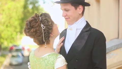 Loving couple in suits Stockbeeldmateriaal 76292350