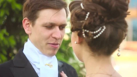 Loving couple in suits Stock Footage 76429969