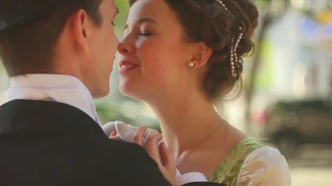 Loving couple in suits Stock Footage 76486591