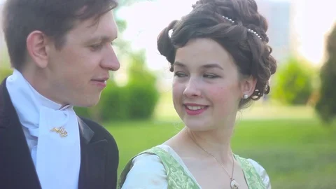 Loving couple in suits Видео 76506995