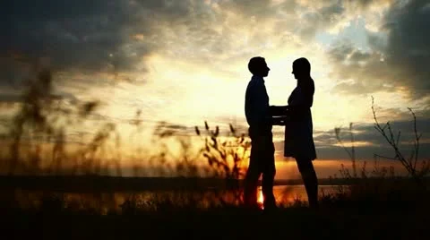 Loving couple at sunset Stock Footage