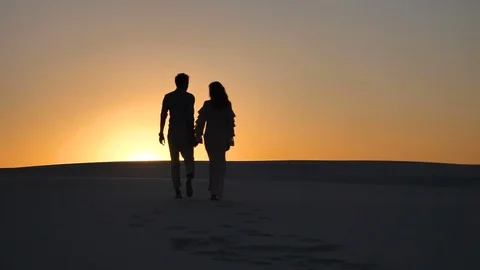 Loving couple at sunset Видео 83601455
