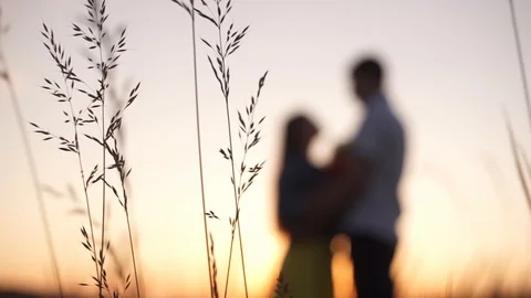Loving couple at sunset, romantic date Stock Footage 127420928
