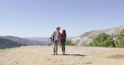 Loving couple walking in mountains Stock Footage
