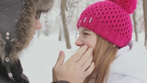 Loving couple in the winter forest Stock Footage 72744324