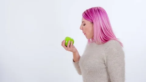 Loving the green apple Stock Footage 83724480