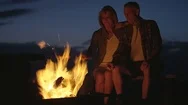 Loving Mature Caucasian American Couple Camping And Cooking Sausages Over A Stock Footage