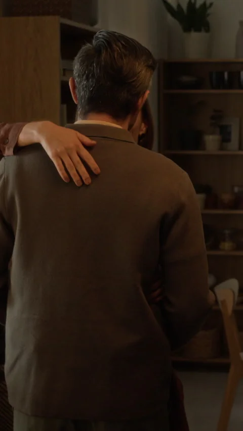 Loving Middle Aged Man and Woman Dancing Slowly and Embracing at Home Stock Footage 338090302