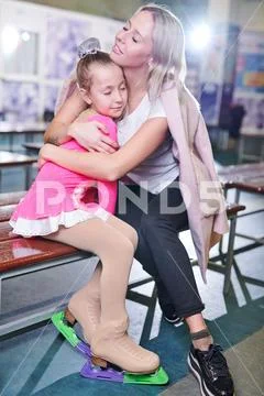 Loving Mother Hugging Talented Daughter Stock Photos