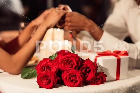 Loving Spouses Holding Hands Celebrating Valentine\'s Day In Restaurant. Cropped