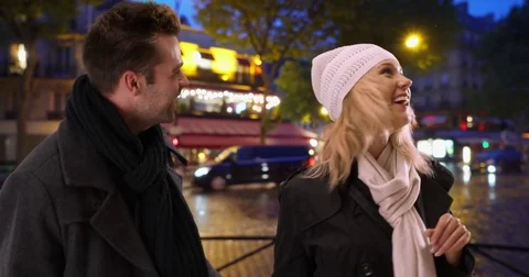 Loving young couple exploring Paris streets at night Stock Footage 85334227