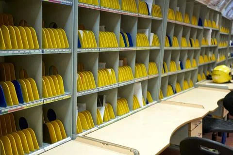 Low activity in the post office while the minimum services are running during Stock Photos