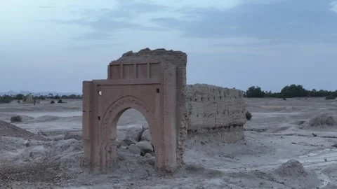 Low Aerial Close-Up of Ancient Mud Brick Archway at Sijilmassa Ruins in Morocco Stock Footage 345523704