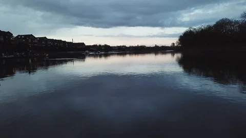 Low aerial drone footage flying over the River Thames, South West London. Stock Footage 87849067