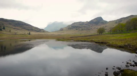 Low aerial drone shot over the Lake District with mountains Stock-Footage 59864688