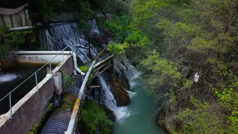 Low Aerial Flight Through Lush Waterfall Canyon Video stock 340141271