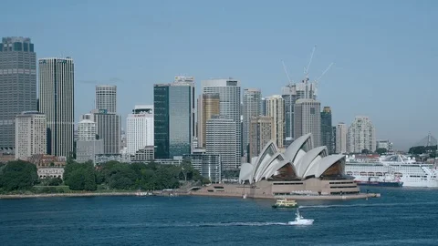 Low Aerial flyover Sydney Opera House, city landmarks, Circular Quays Video stock 79309104