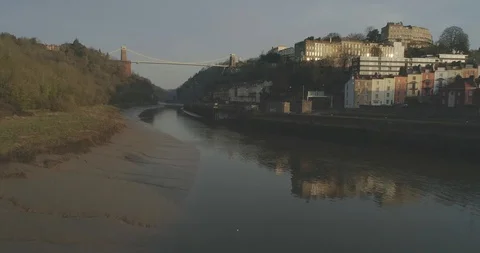 Low aerial moving forward over the Avon River towards Bristol's iconic Clifton 스톡 동영상 108043086