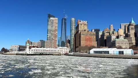 Low Aerial Over Drift Ice Tilting Up To Lower Manhattan Skyline And Pier A Vídeo Stock 342649466