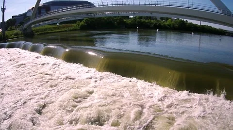 Low aerial panning view of a small dam Video stock 56401876
