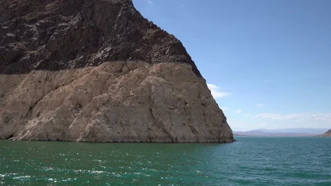 Low Aerial Partial Orbit of Cliff on Lake Mead Stock Footage