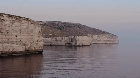 Low Aerial Shot flying sideways at Dingli Cliffs Stock Footage 113119081