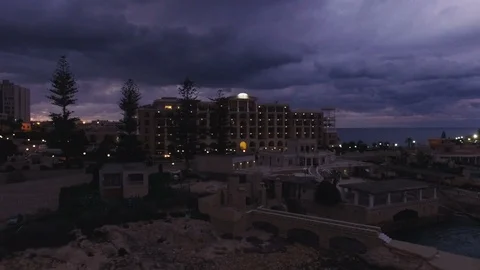 Low Aerial shot orbiting around Westin Dragonara in Malta Stock Footage 92079454