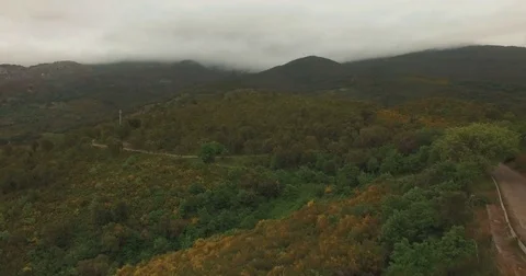 Low Aerial shot over Mountains Stock Footage 76922996