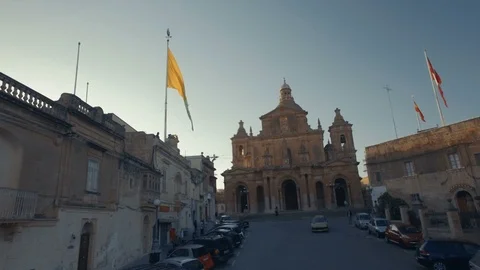 Low Aerial shot revealing Saint Nicholas Parish Church in Siggiewi Malta Stock Footage 91977276