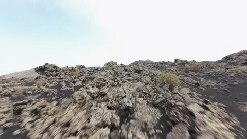 Low aerial view gliding over landscape of Teneguia volcano in La Palma Stock-Footage 308404333