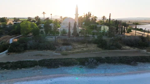Low aerial view of Larnaca Salt Lake in Cyprus. Stock Footage 341539497