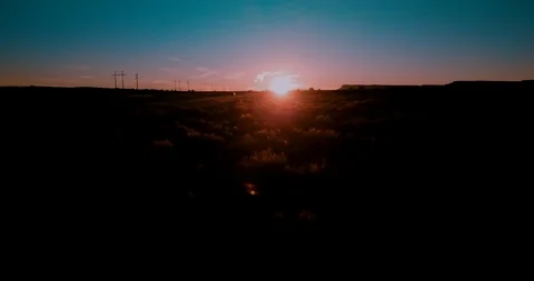 Low Aerial View of Sun Setting in Utah Stock Footage 91364547