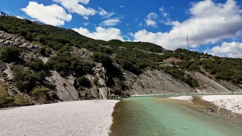 Low Aerial View Under Bridge Over Clear Mountain River Stock Footage 332059684
