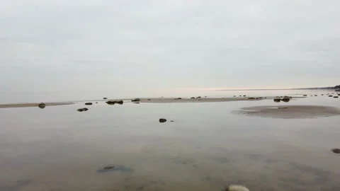 Low aerial view view of rocks in water Stock Footage 162066140