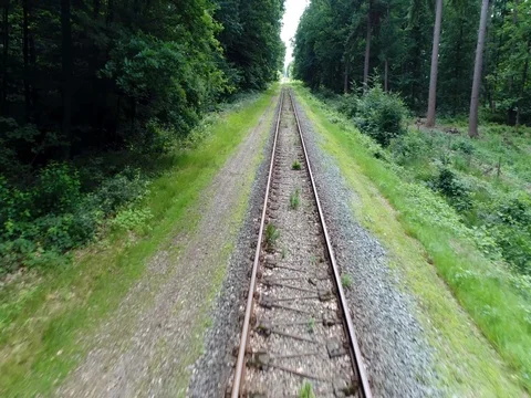 Low altitude aerial flight over track on railway railroad 4k Stock Footage 80531773