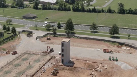 Low altitude aerial view of construction site work Stock Footage 113030828