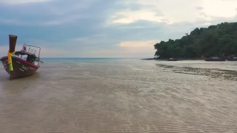 Low altitude drone between long tail traditional thai boats. Krabi, Thailand. Stock Footage 245977462