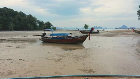 Low altitude drone between long tail traditional thai boats. Krabi, Thailand. Stock Footage 245978221