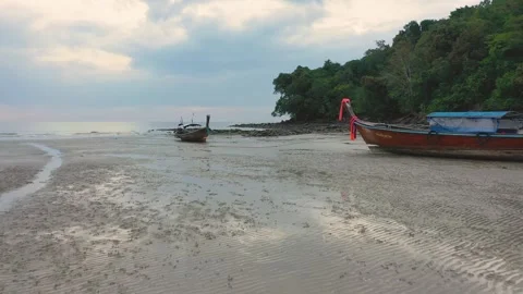 Low altitude drone between long tail traditional thai boats. Krabi, Thailand. Stock Footage 245978517