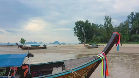 Low altitude drone between long tail traditional thai boats. Krabi, Thailand. Stock Footage 245978641