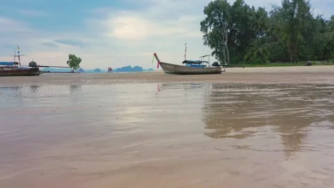 Low altitude drone between long tail traditional thai boats. Krabi, Thailand. Stock Footage 245978753