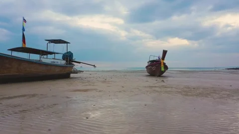 Low altitude drone between long tail traditional thai boats. Krabi, Thailand. Stock Footage 245978841