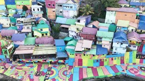 Low Altitude Drone Flight Above Colorful Riverside Houses Stock Footage 340542572