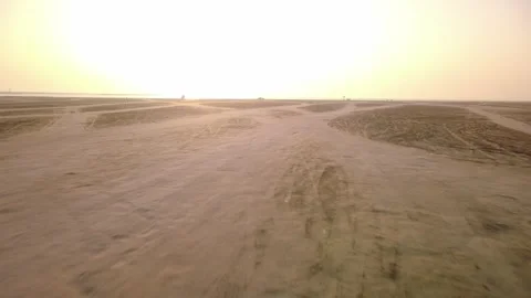 Low Altitude Drone Flight Along Sandy Beach in Al Khobar Stock Footage 336572521