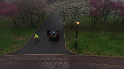 A low altitude drone flight in Flushing Meadows Corona Park on a foggy morning Stock Footage 333347451