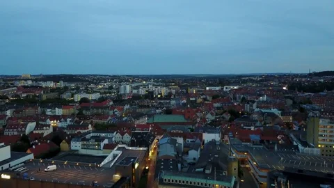 Low altitude drone flight over city of Aalborg, Denmark in the evening Stock Footage