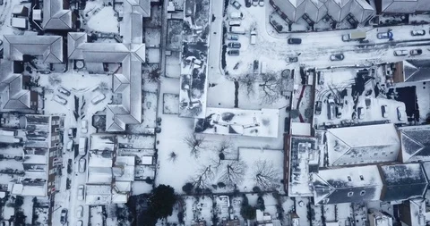 Low altitude drone flight over London during a rare snowstorm in March, 2018. Stock Footage 86564566