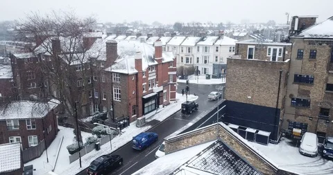 Low altitude drone flight over South West London during a snowstorm. Stock-Footage 87168334