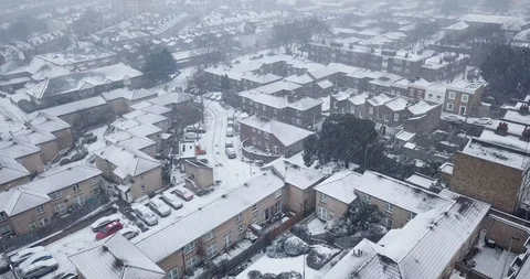 Low altitude drone flight over South West London during a snowstorm. Stock-Footage 87168635