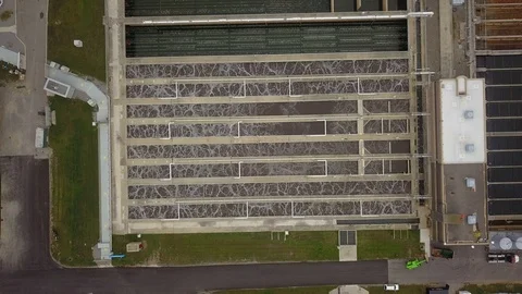 Low altitude drone flight over a sewage treatment plant. Stock Footage 94705750